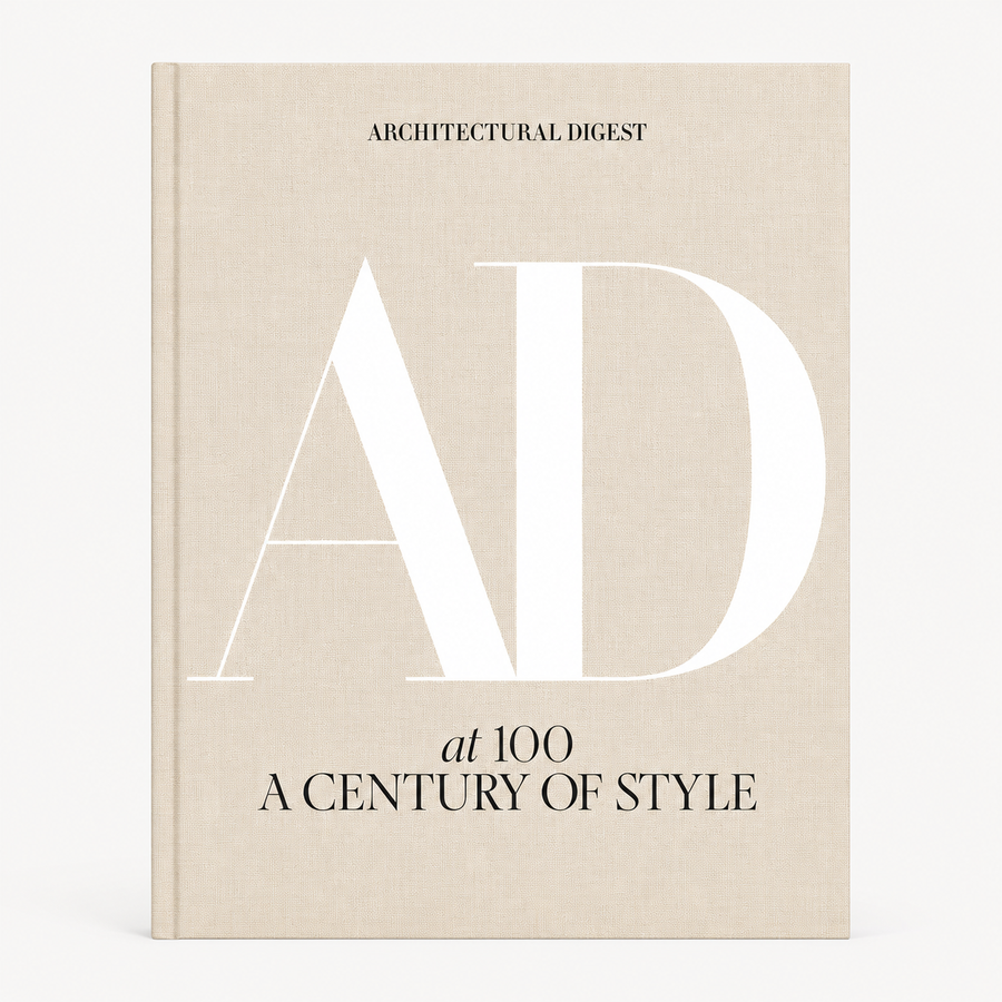 AD at 100: A Century of Style hardcover book with a beige linen cover and large white AD lettering.
