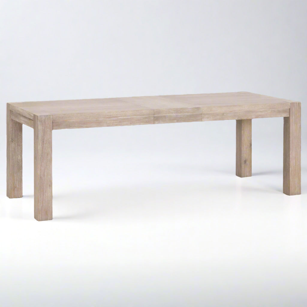 Adler Extension Dining Table in natural gray acacia wood with two visible extension leaves.