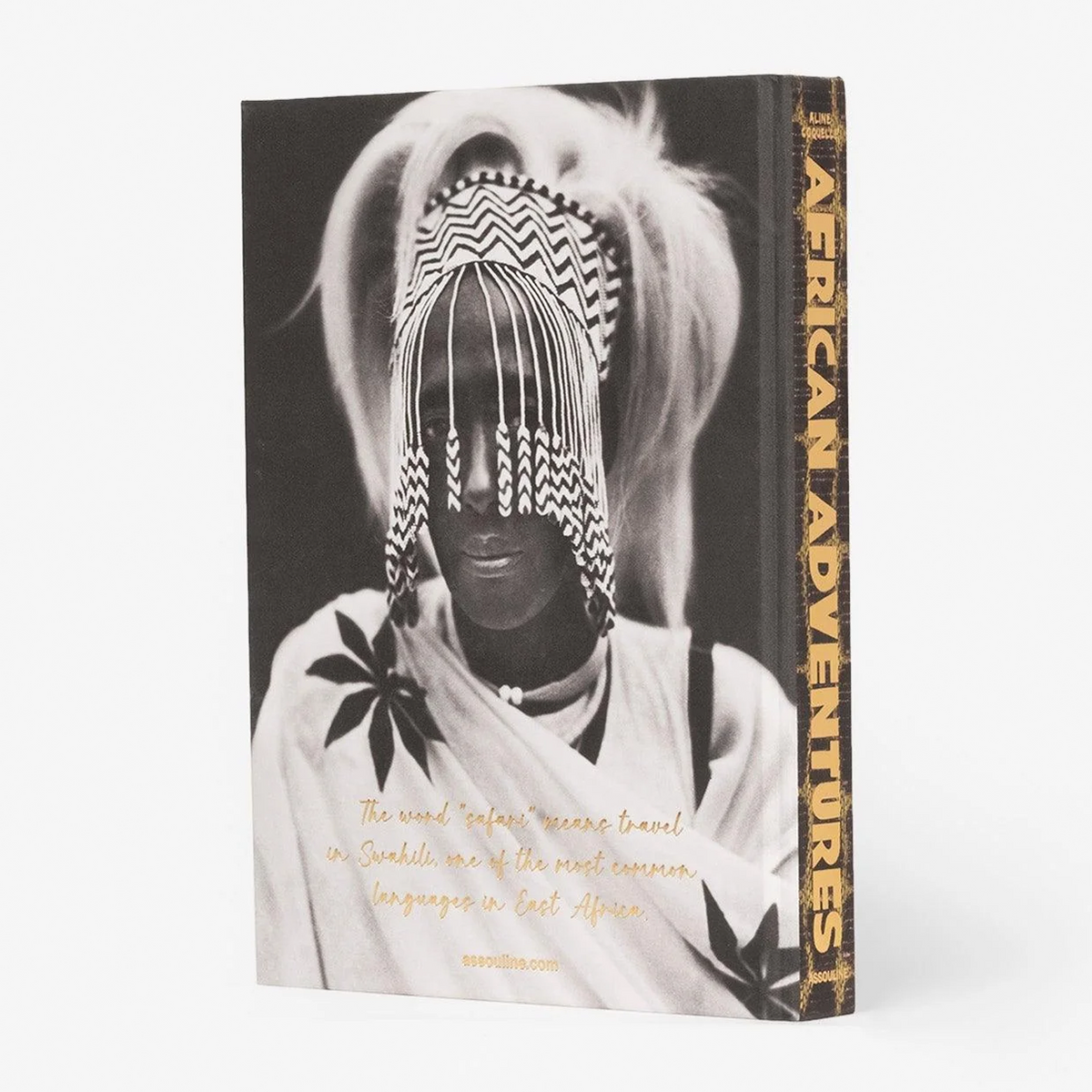 African Adventures book, silk hardcover, black and white photo of a person in traditional African attire.