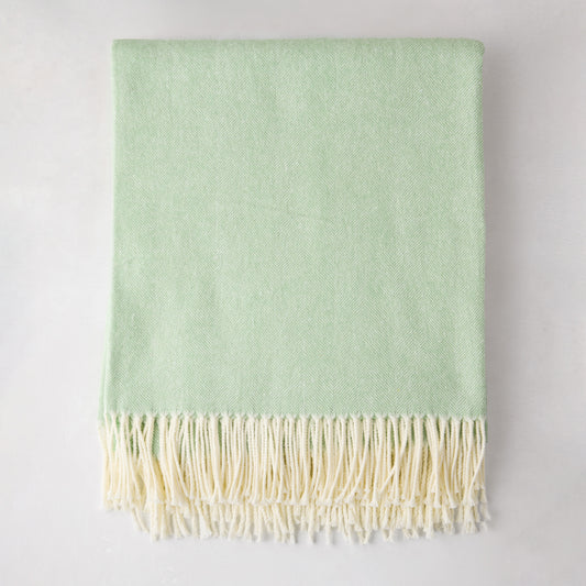 Agave Green Italian Herringbone Throw Blanket, 51"x67", cotton-acrylic blend, with cream fringe.