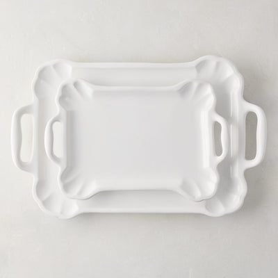 Set of 2 Alessia vintage-inspired creamy white ceramic serving platters, small and large, with handles.