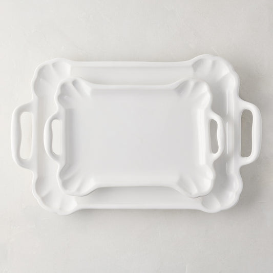 Set of 2 Alessia vintage-inspired creamy white ceramic serving platters, small and large, with handles.