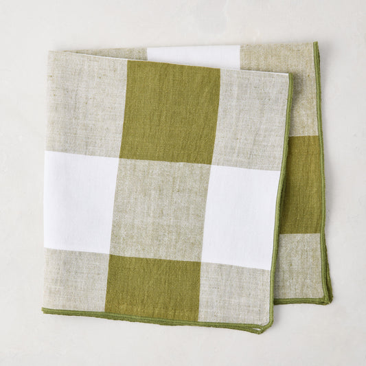 Folded Aloe Green Buffalo Check Linen Napkin, 20" x 20", with white and green squares.