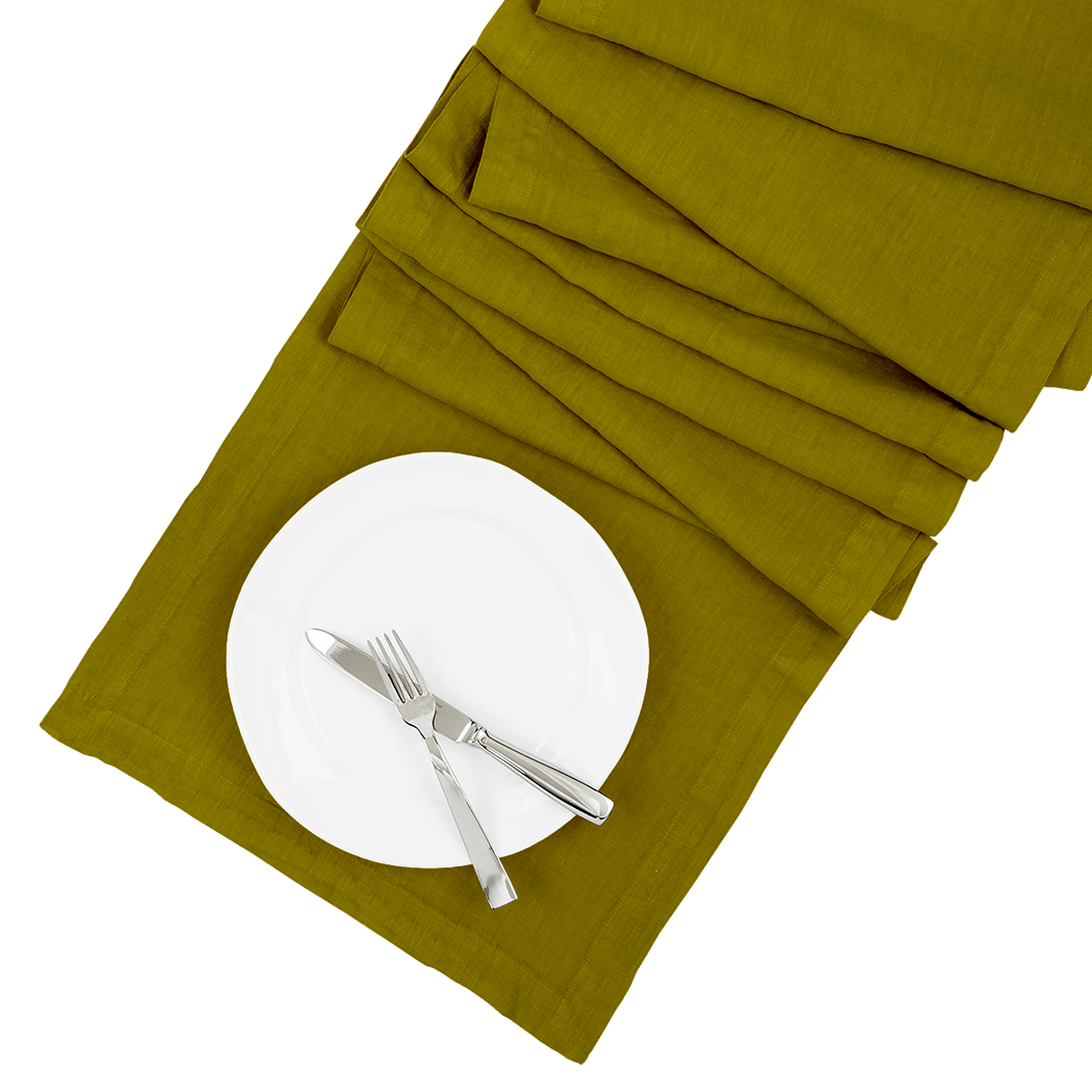 Aloe Green HG hand-dyed linen table runner, 18" x 108", with white plate and silverware.