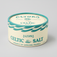 Altura Celtic Salt in a round, cream-colored container with teal wave patterns and text.