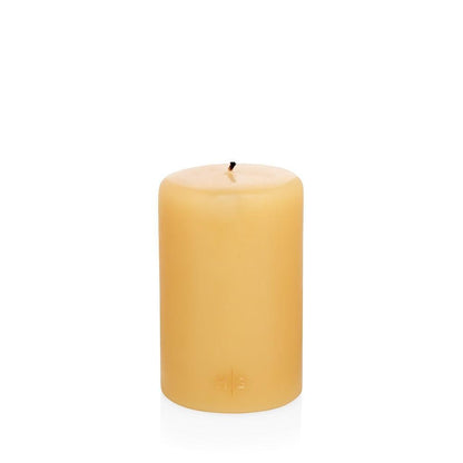 HG Amber Unscented Pillar Candle, 4"x6", hand-dipped paraffin with gold HG logo.