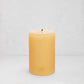 HG Amber Unscented Pillar Candle, 4"x6", with subtle gold HG logo.