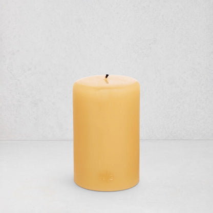 HG Amber Unscented Pillar Candle, 4"x6", with subtle gold HG logo.