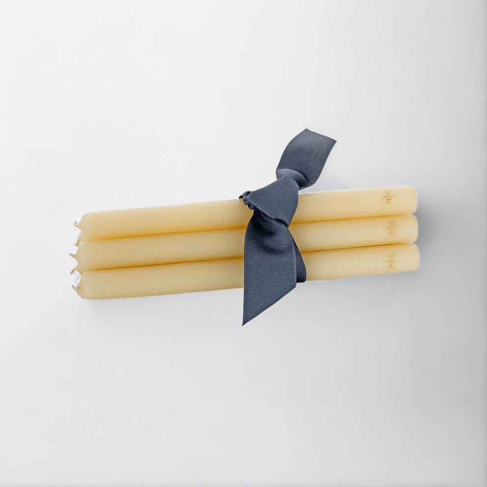 HG Amber Unscented 10" Taper Candle Bundle, set of 5, tied with a dark ribbon.
