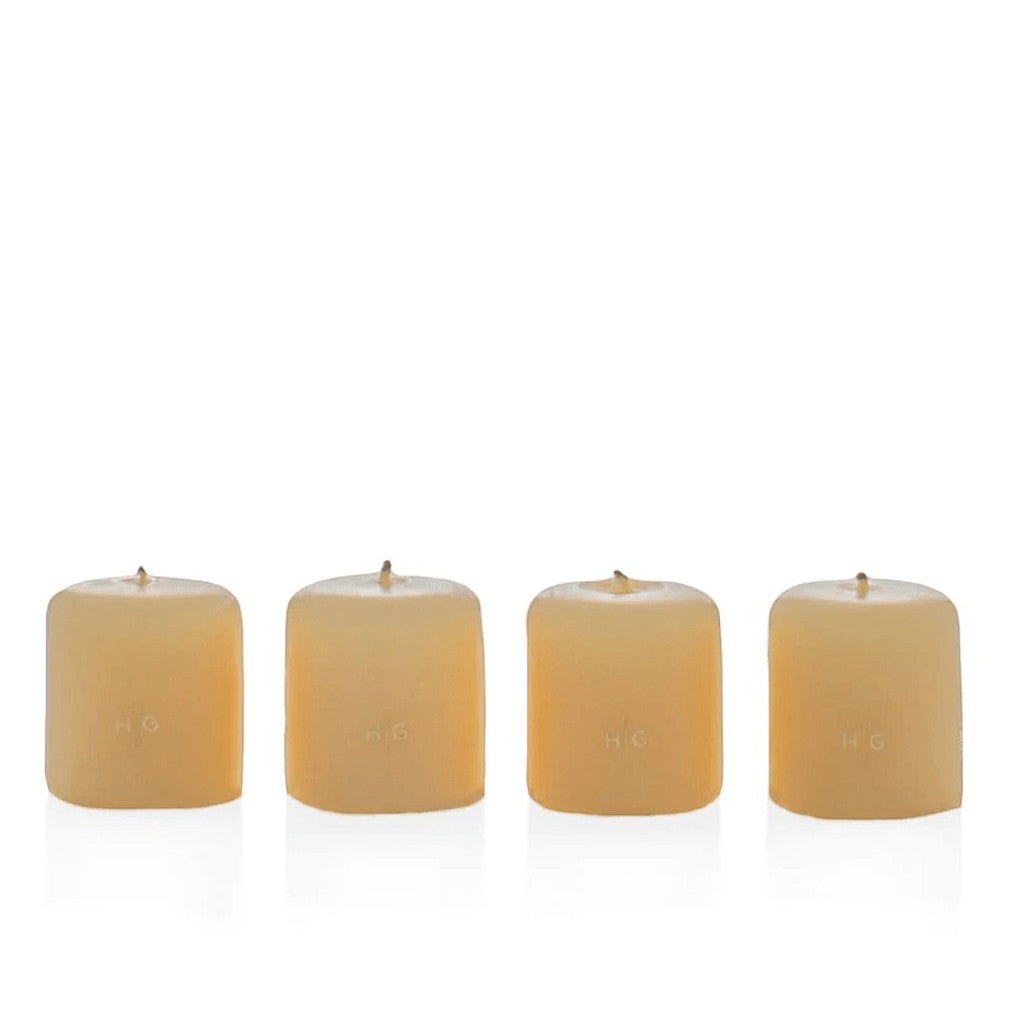 Set of 4 HG Amber Unscented 2" Votive Candles, hand-dipped paraffin with gold HG logo.