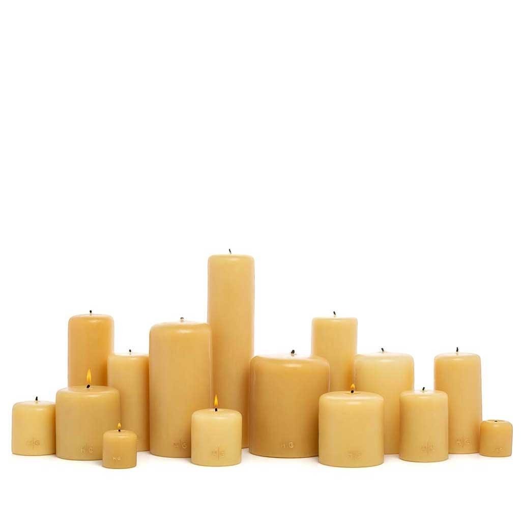 Set of 4 HG Amber Unscented 2" Votive Candles, hand-dipped paraffin with gold HG logo.