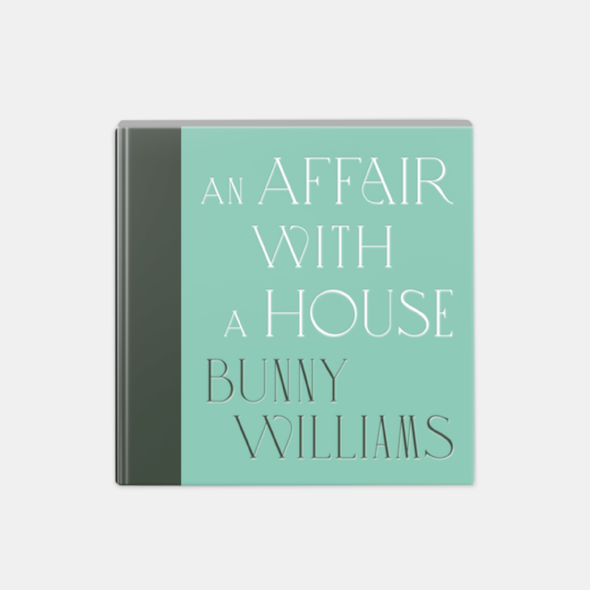 Hardcover book, "An Affair With A House" by Bunny Williams, light teal cover with white text.