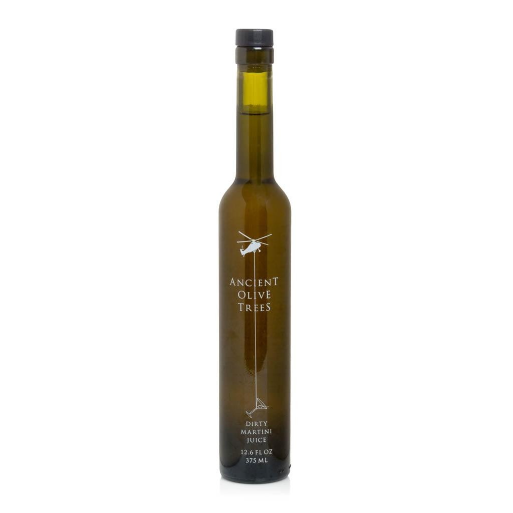 Ancient Olive Trees Dirty Martini Juice in a tall, slender dark green glass bottle with a black cap.