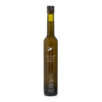 Ancient Olive Trees Dirty Martini Juice in a tall, slender dark green glass bottle with a black cap.