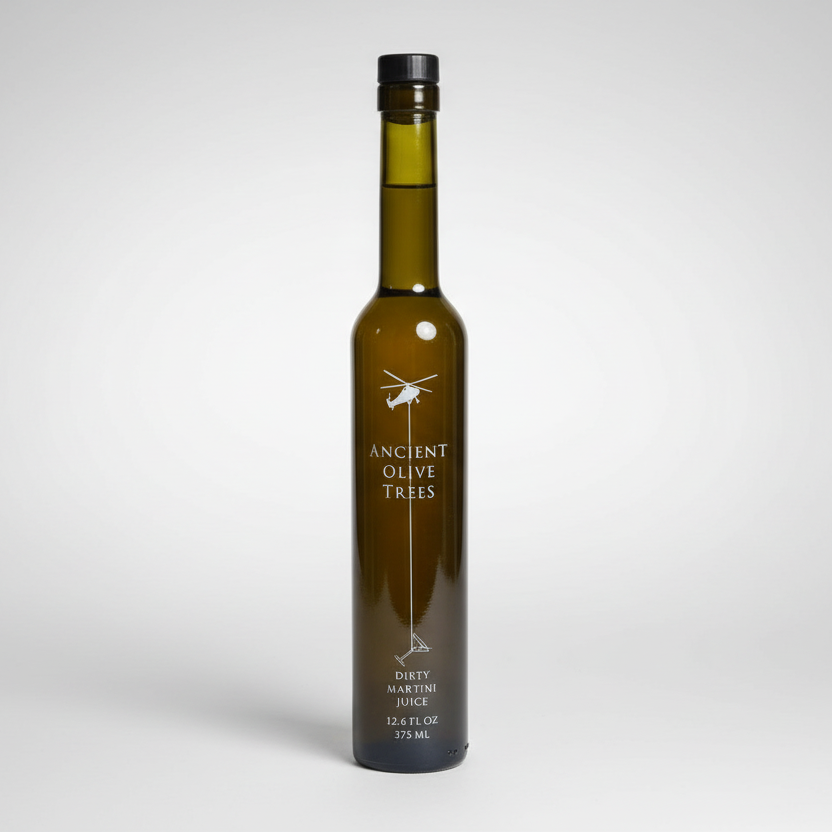 Ancient Olive Trees Dirty Martini Juice in a tall, dark green glass bottle with a black cap.