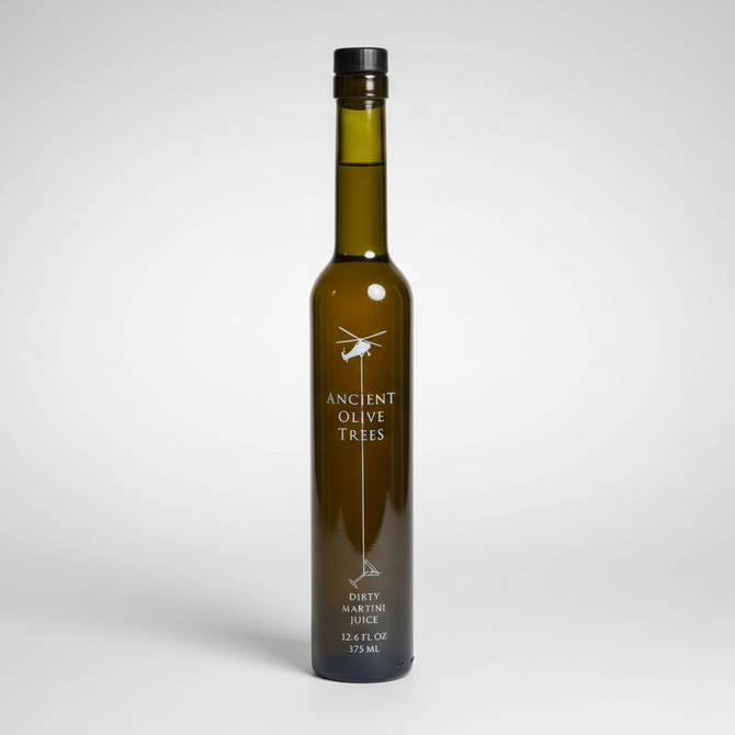 Ancient Olive Trees Dirty Martini Juice in a tall, dark green glass bottle with a black cap.