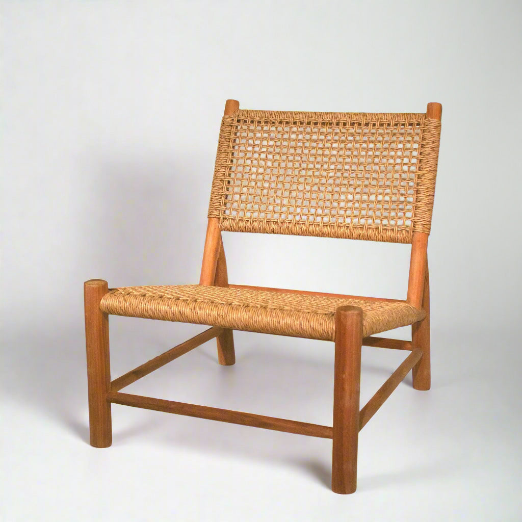 Andrea Woven Teak Wood Lounge Chair with light brown synthetic fiber seat and back.