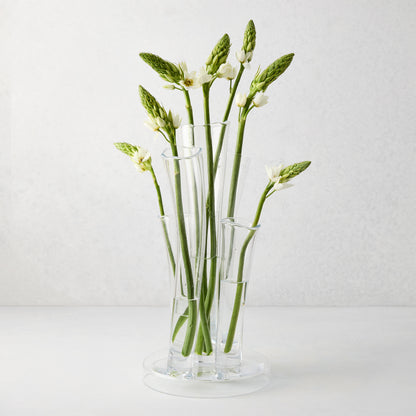 Angelina Small Scissor-Cut Glass Vase, clear, handmade, with stair-step fluted tubes and white flowers.