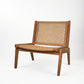 Anne Lounge Chair with a modern silhouette, solid reclaimed teak frame, and woven synthetic fiber seat and back.