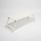 Antique white slatted hardwood outdoor picnic table with folding legs and umbrella hole.
