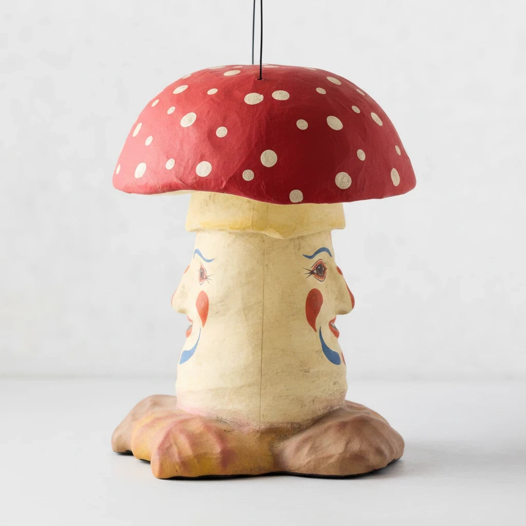 Hudson Grace papier-mâché mushroom candy bucket with a vintage-inspired hand-painted face and red spotted cap.