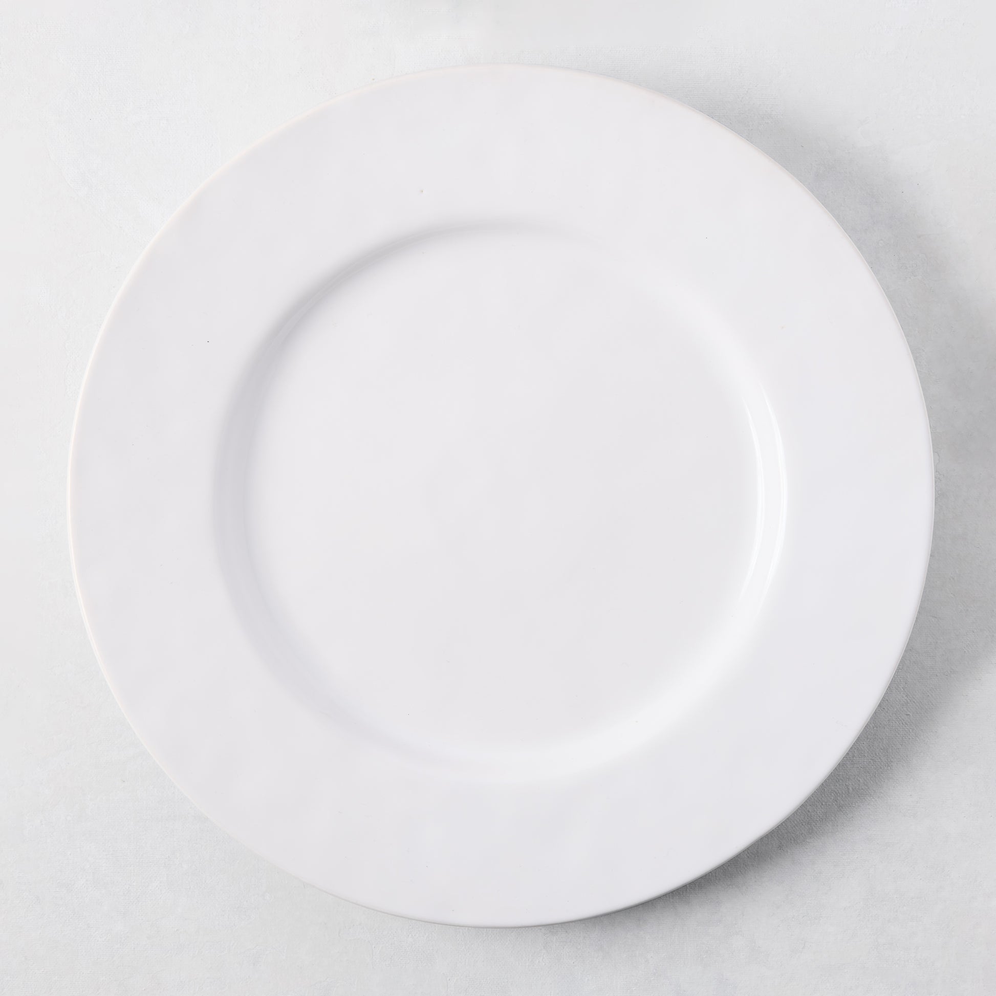 Artisan Stoneware Oversized Dinner Plate, creamy white, 12.75"Dia, wide lip, clean edges.