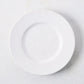 Artisan creamy white stoneware salad plate, 8.27"Dia, with a wide lip.