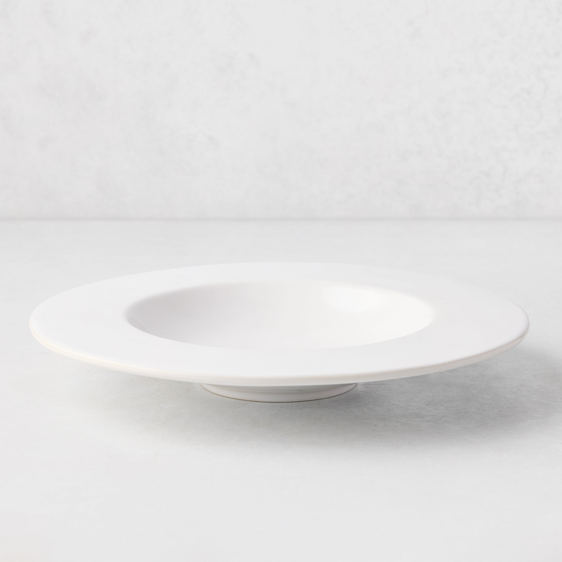Artisan white stoneware soup bowl with wide lip, 9.45"Dia.