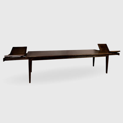 Auberge extendable oak dining table, mahogany color with vintage patina, butterfly leaves partially extended.