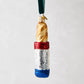 Hand-painted glass baguette ornament with red, white, and blue French flag design, "Baguette" text, and glitter.