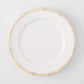 White ceramic salad plate with a natural-edged, bamboo-molded rim.