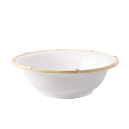 White ceramic serve bowl with a natural-edged, painted bamboo rim.
