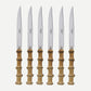 Set of 6 bamboo steak knives with stainless steel blades and varnished wood handles.