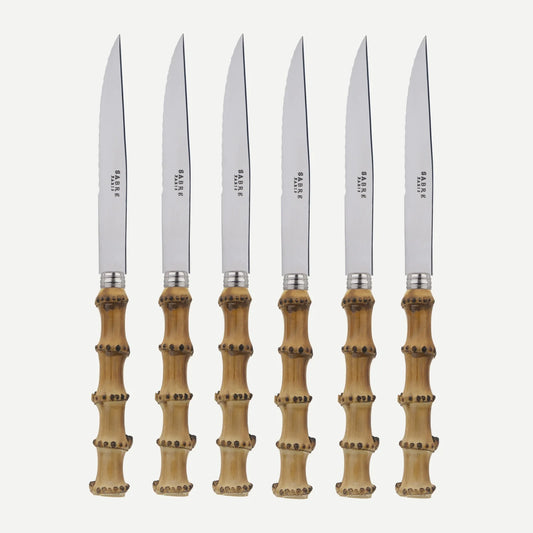 Set of 6 bamboo steak knives with stainless steel blades and varnished wood handles.
