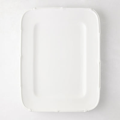 White ceramic rectangular serving platter with a molded bamboo-style edge, 17"L x 13"W.