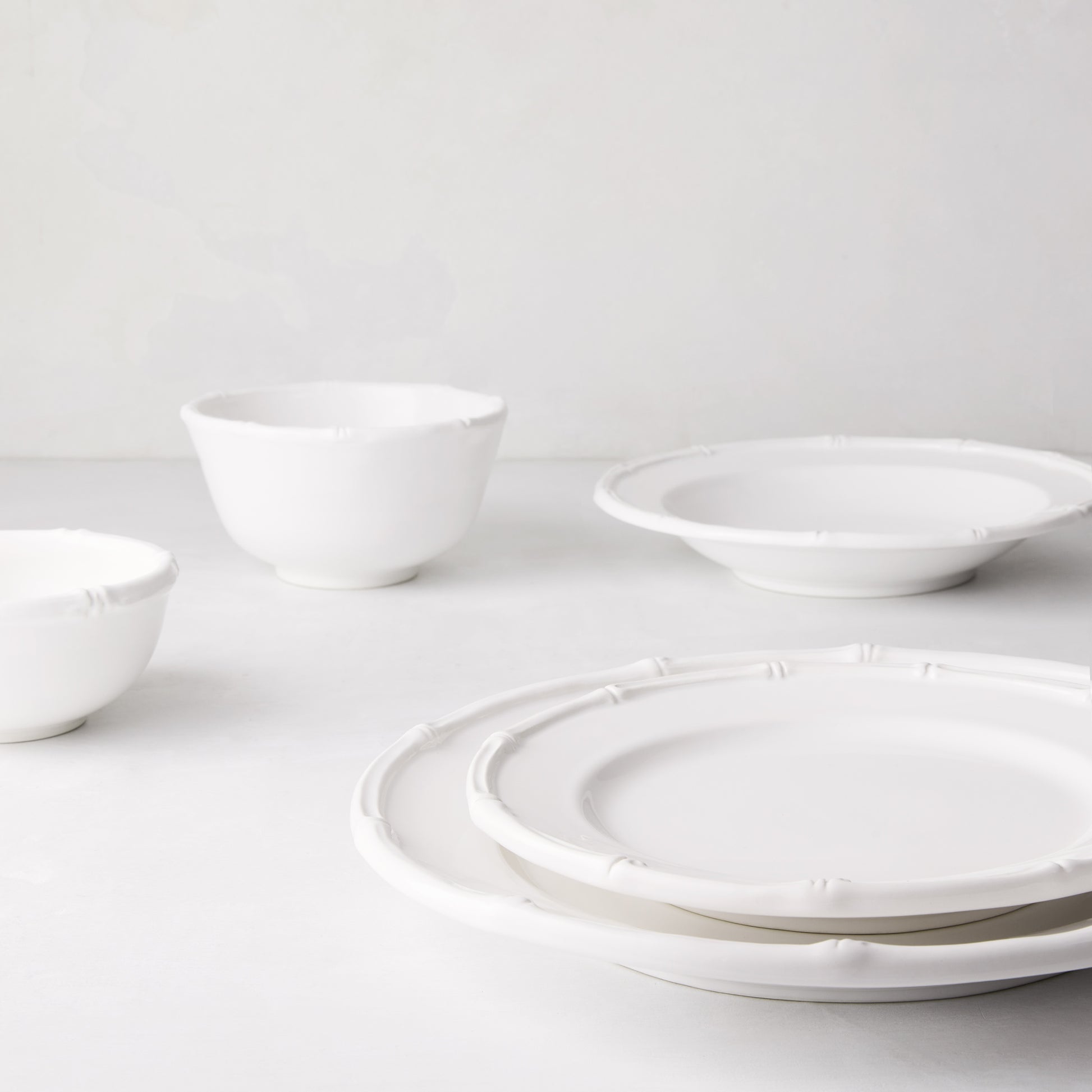 White ceramic salad plate with molded bamboo detailing, 8.5" Dia, part of the Bamboo collection.