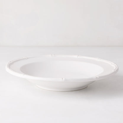 White ceramic soup bowl with molded bamboo detailing, 9.5" diameter.