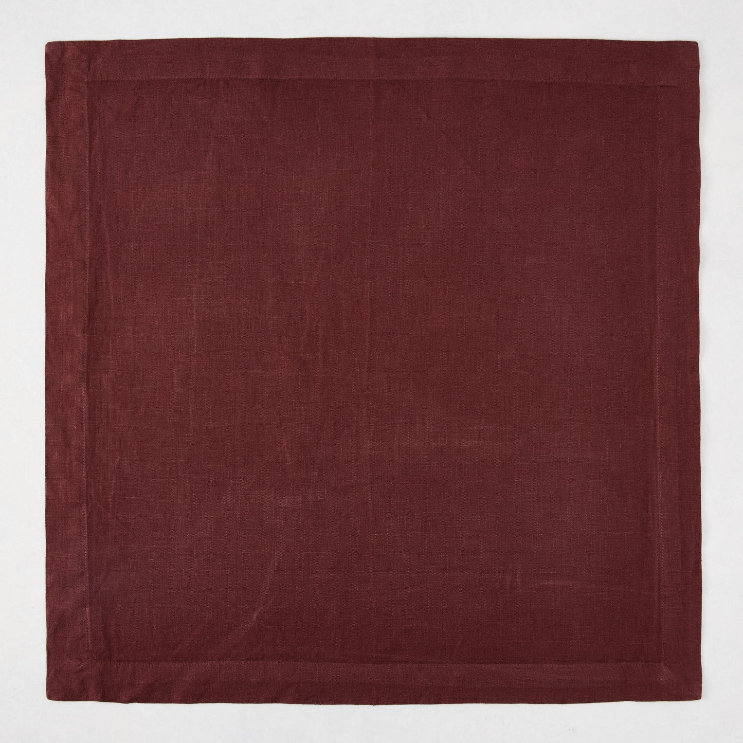 Barnwood HG Signature Hand-dyed Linen Napkin, 22-inch square, soft warm maroon, mitered corners.