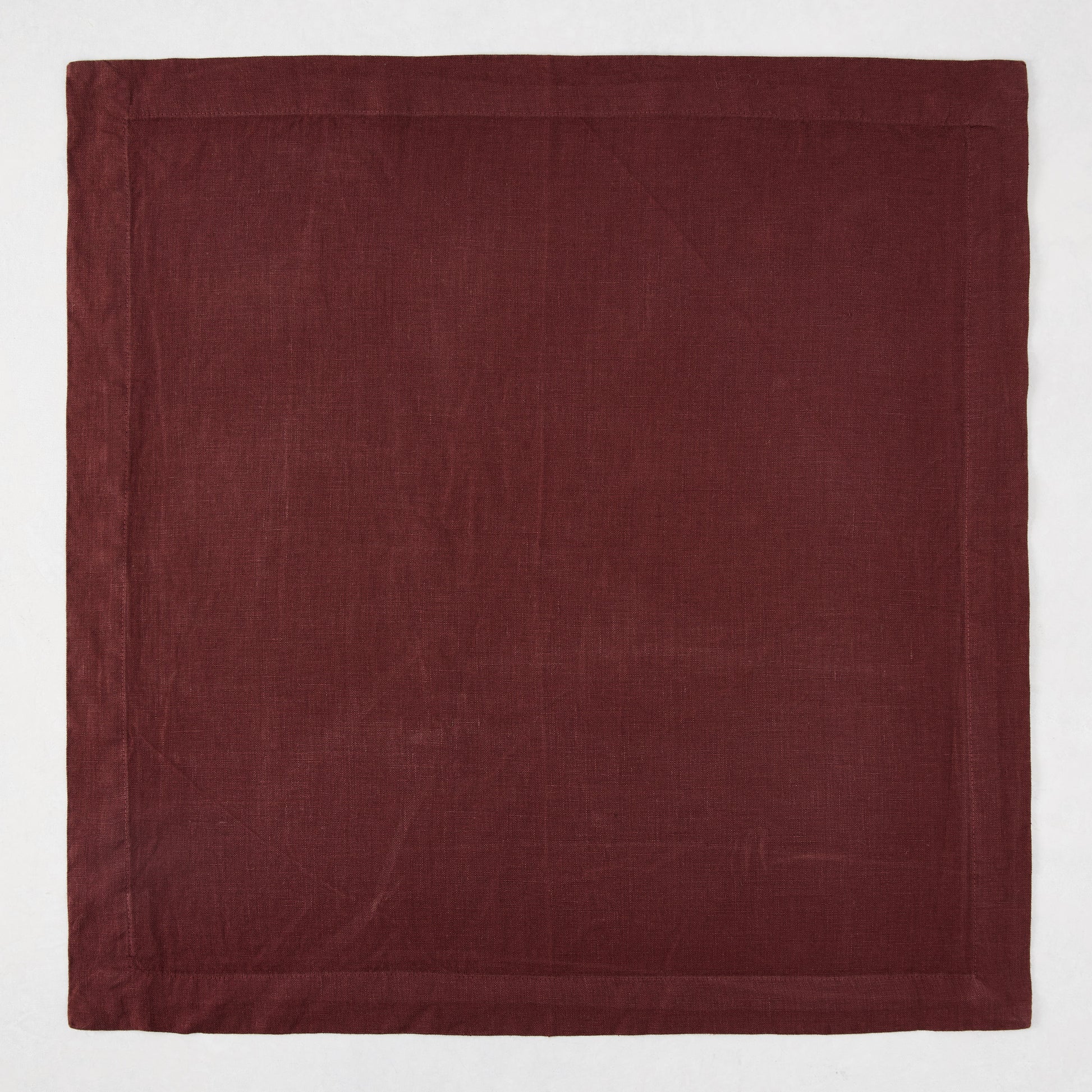 Barnwood HG Signature Hand-dyed Linen Napkin, 22-inch square, soft warm maroon, mitered corners.
