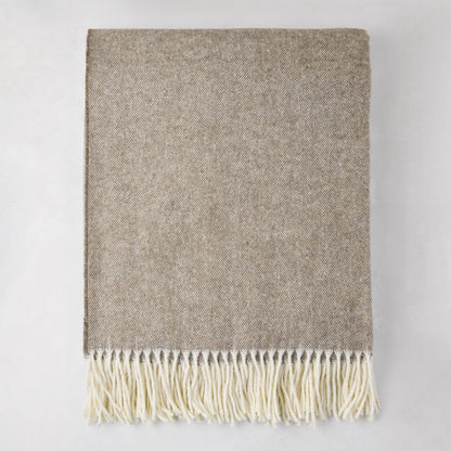 Barnwood Italian Herringbone Throw Blanket, cashmere-soft cotton-acrylic, with decorative fringe.