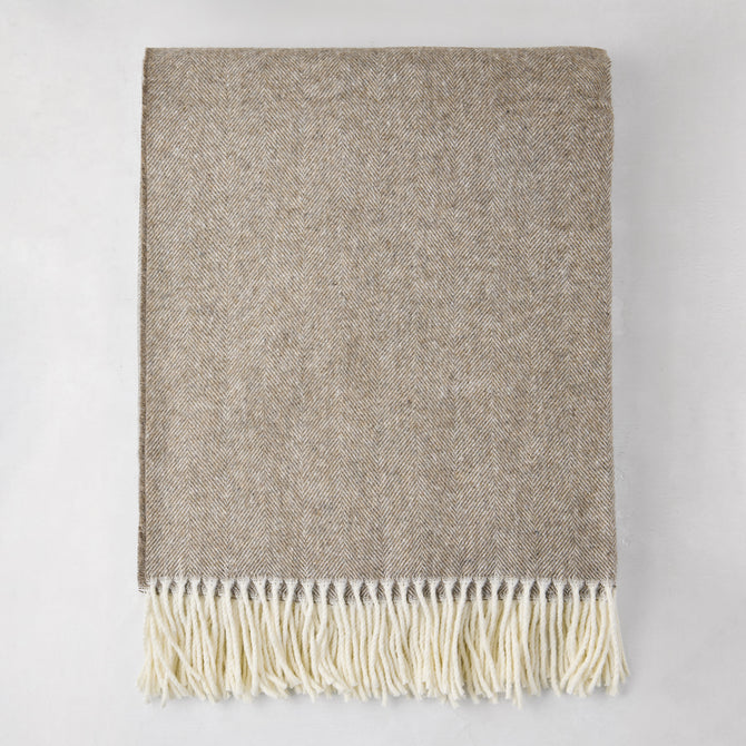 Barnwood Italian Herringbone Throw Blanket, cashmere-soft cotton-acrylic, with decorative fringe.