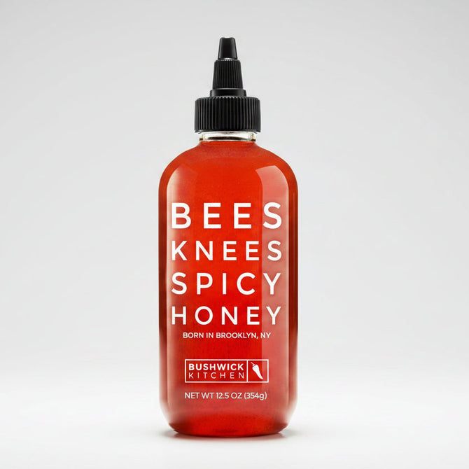 Bees Knees Spicy Honey, 12.5 oz red squeeze bottle with black cap and white label.