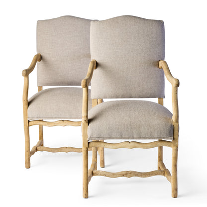 Pair of vintage Belgian armchairs in bleached oak with neutral linen upholstery and rustic hand-hewn wooden frames.