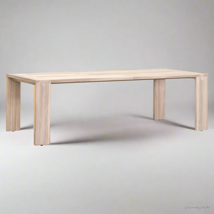 Big Sur Dining Table, solid light natural teak wood, sleek minimalist design.
