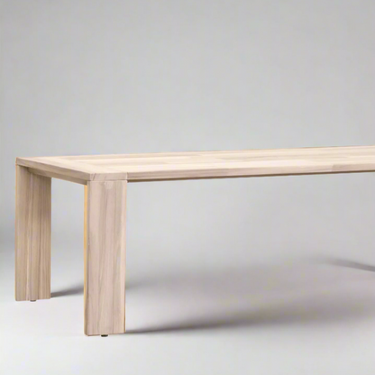 Big Sur Dining Table, natural solid teak wood, sleek minimalist design.