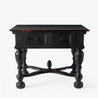 Ebonized black wood console table with two drawers, turned legs, and a decorative cross-stretcher with a central knob.