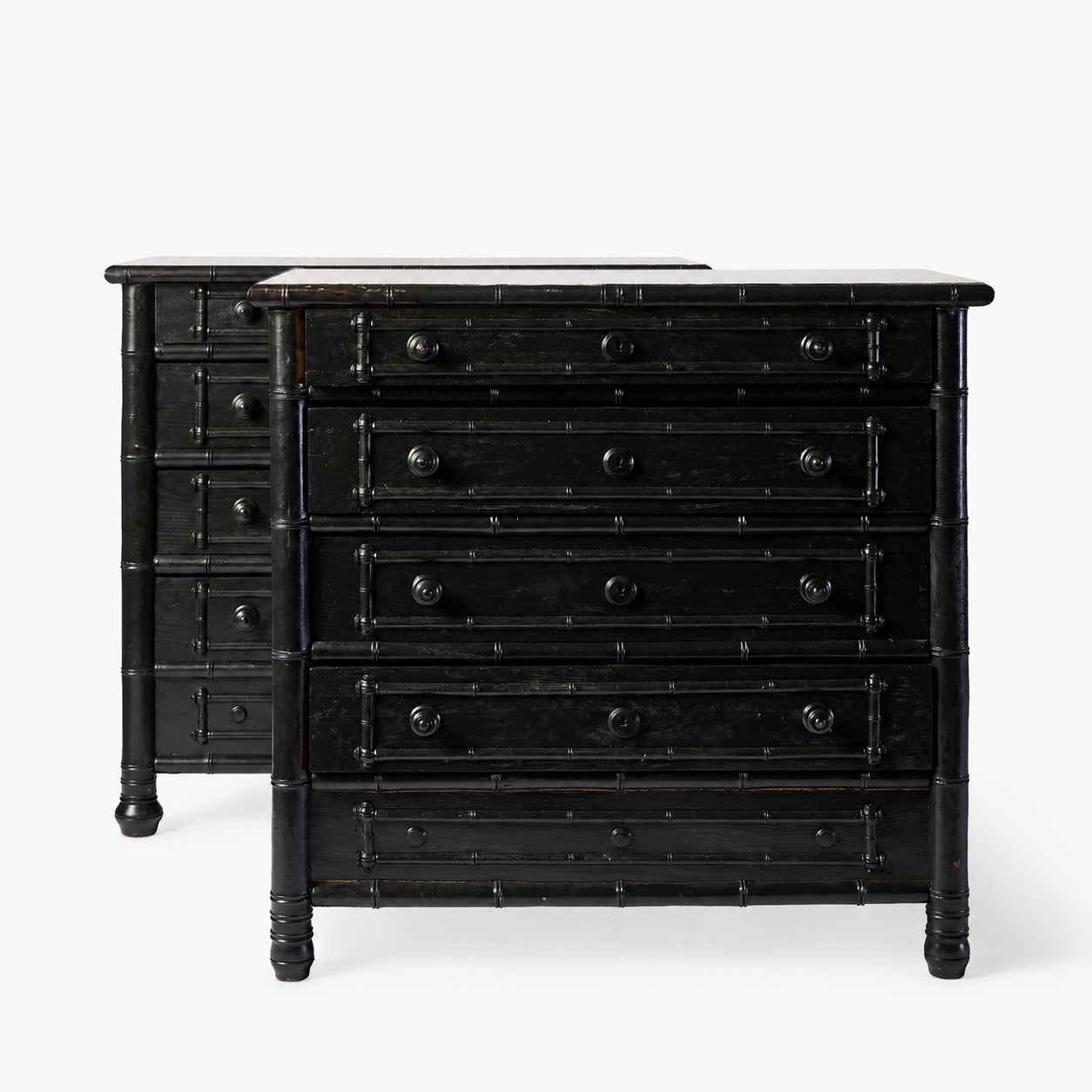 Pair of 1920s Parisian ebonized dressers with faux bamboo carved wood detailing and five drawers each.