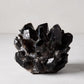 Black genuine quartz crystal votive candle holder, 6.5"Dia x 5.5"H, with raw, unrefined elegance.