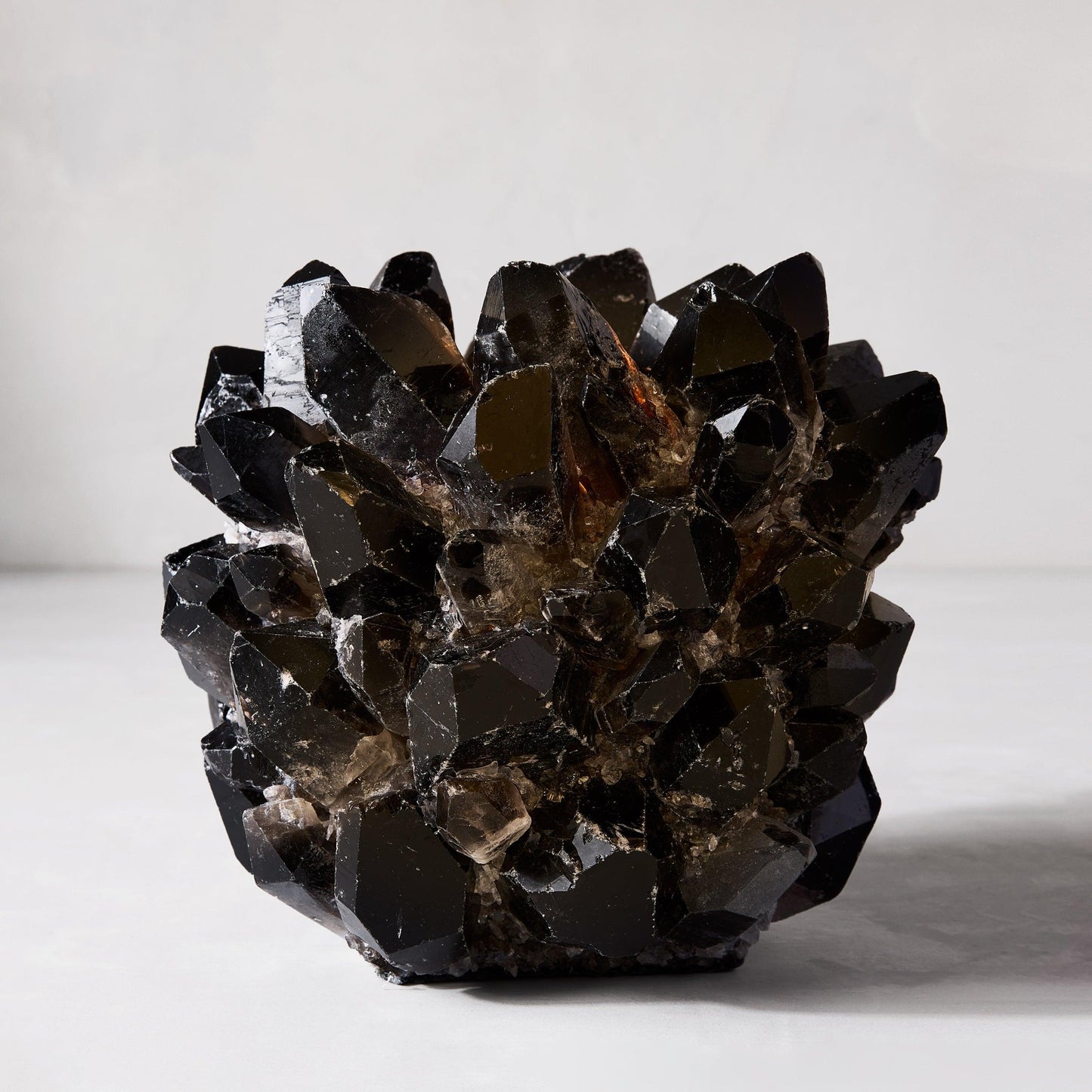Black Grande Quartz Votive Candle Holder, 9"Dia x 7"H, made of genuine dark quartz crystals.