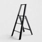 Hudson Grace Hasegawa Lucano 3-step ladder in matte black aluminum and steel with a minimalist folding design.
